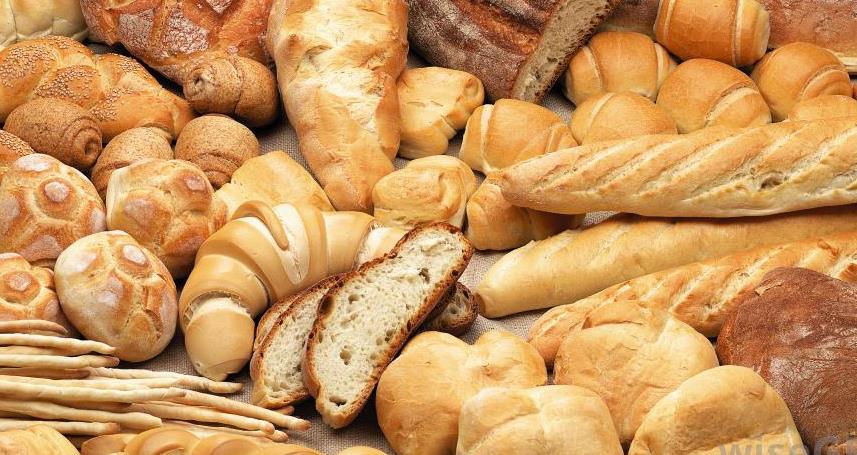 ICAK Health Tips - image on numerous gluten rich baguettes, roles, croissants, breadsticks and bread loafs